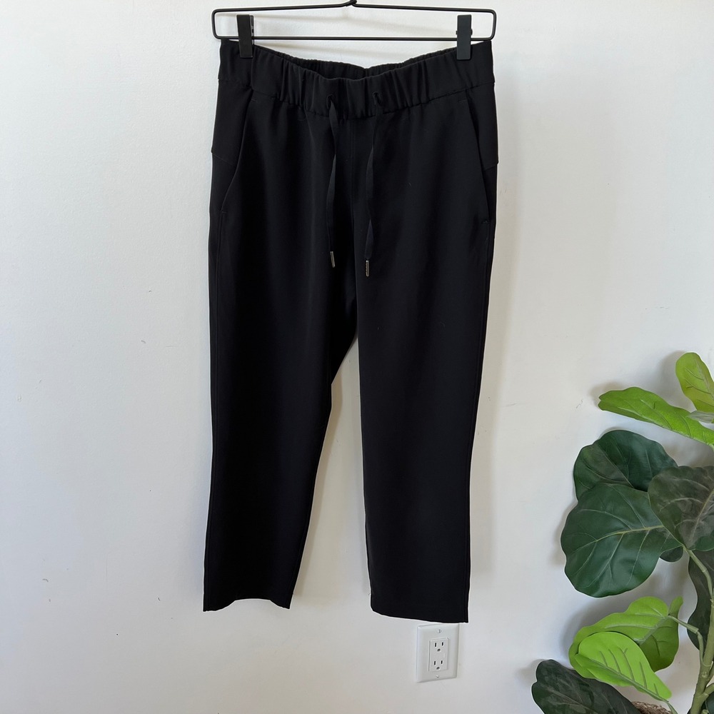 Lululemon On the Fly 7/8 Pant Black Size 4 Luxtreme Drawstring Travel Jogger